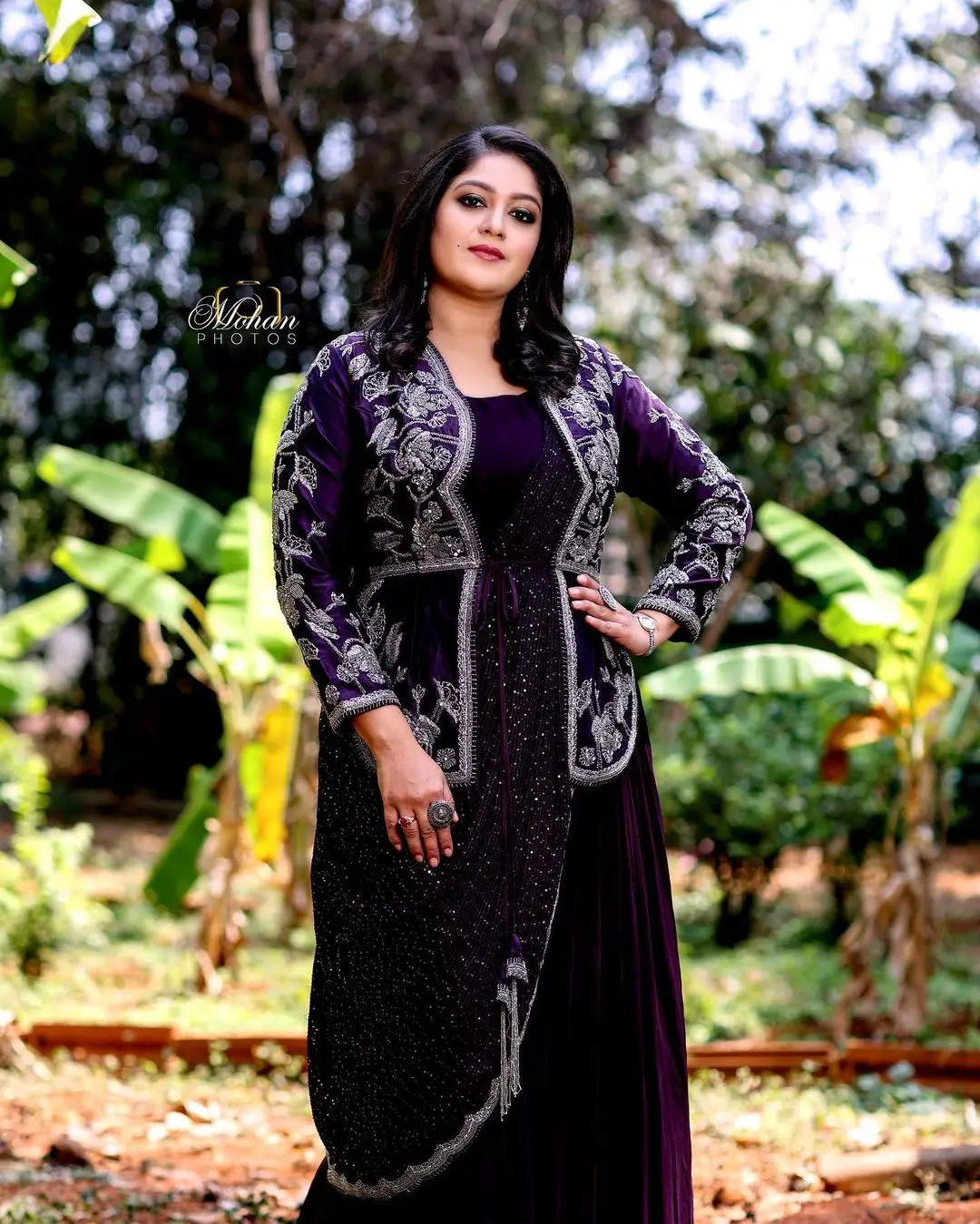 Meghana Raj Wearing Beautiful Earring Black Designer Gown